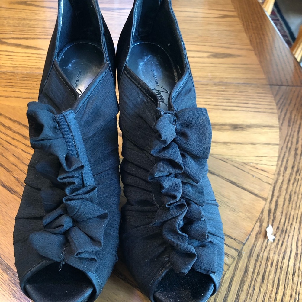 Black ruffled heels